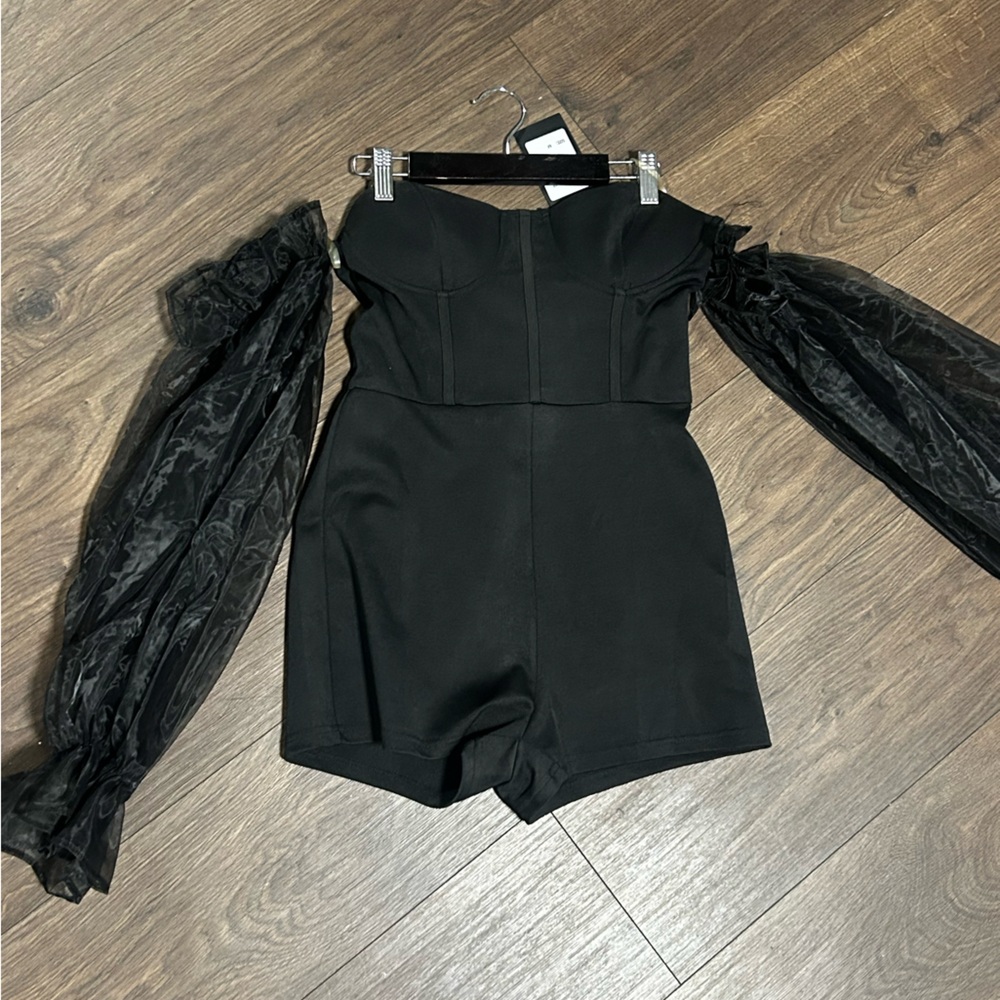 Black boutique shorts romper with off the shoulder sheer sleeves